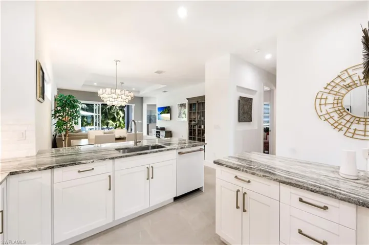 Kitchen featuring light grey colored granite counter tops and SS Farmers sink.