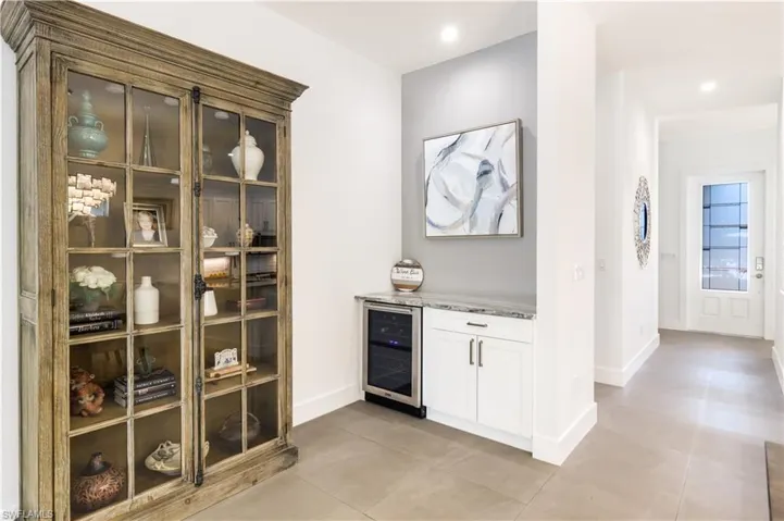 Bar with wine cooler.
