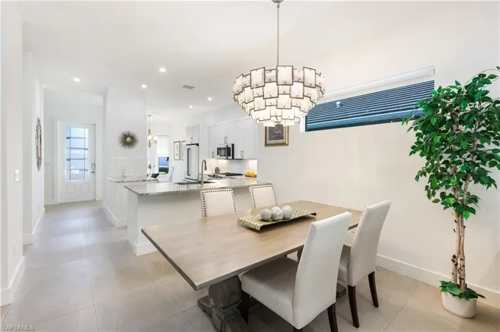 Dining room featuring imported Italian glass chandelier.