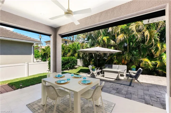 Lanai with motorizes screens for bug free outdoor dining.