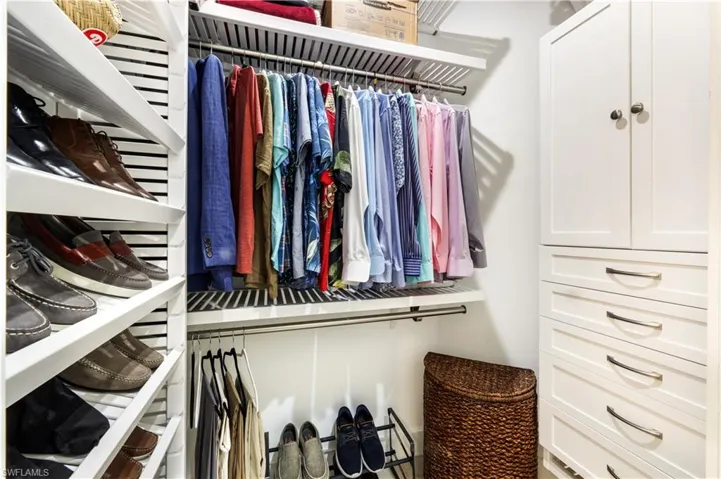 View of spacious custom closets.
