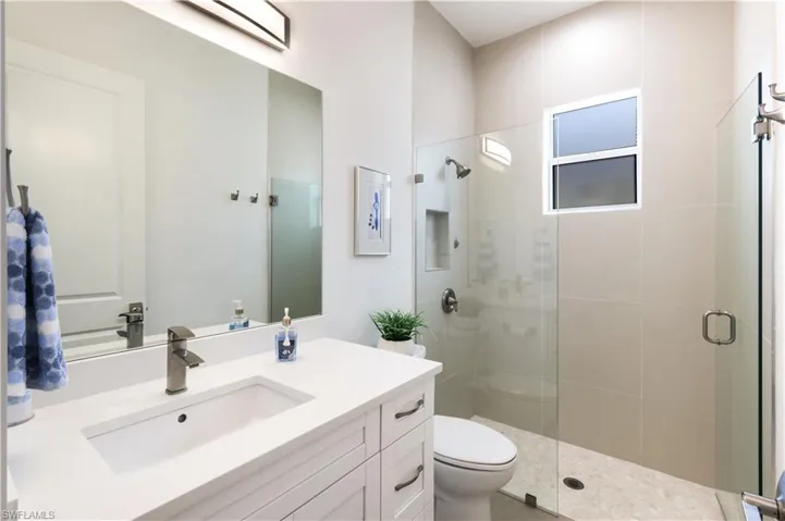 On suite Guest bathroom with full bath.