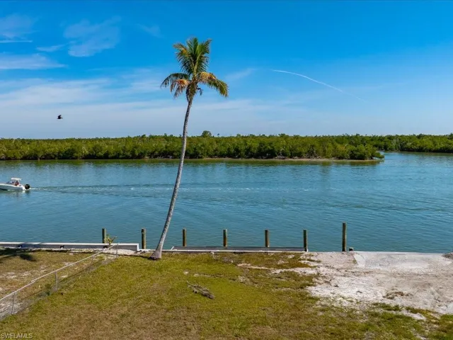 View of water feature featuring a dock