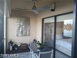Screened lanai featuring ceiling fan