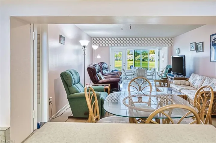 Dining space featuring tile patterned floors