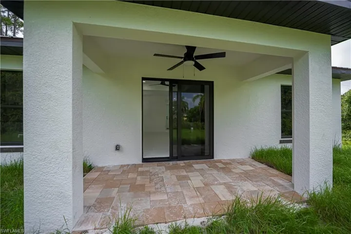 View of patio / terrace with ceiling fan