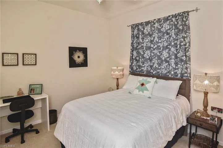 Bedroom with carpet flooring