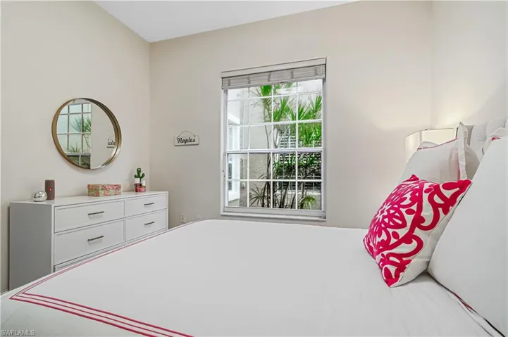 Light guest room with reach in closet.
