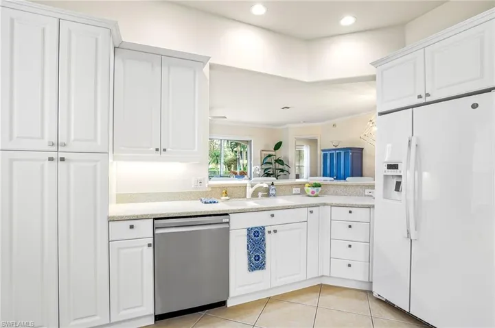 Large extra floor to ceiling pantry cabinets in kitchen.