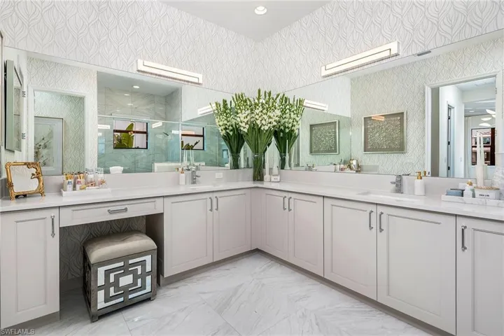 Bathroom with vanity and an enclosed shower
