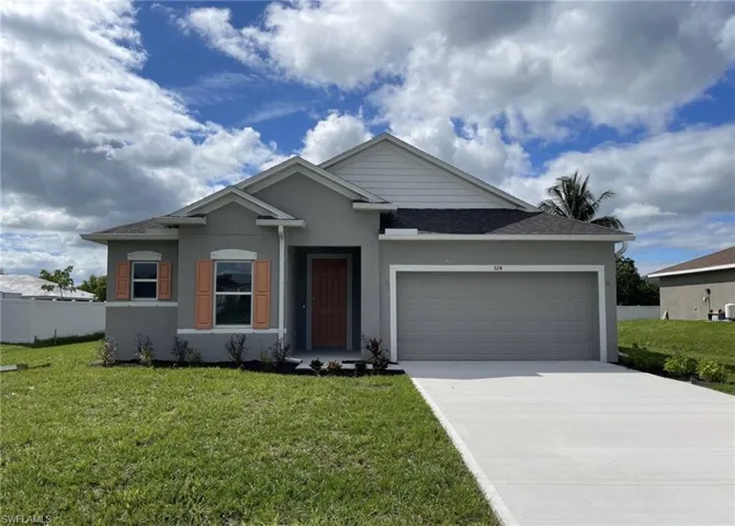 Stunning Exterior on the perfect lot! Block construction and decorative shutters