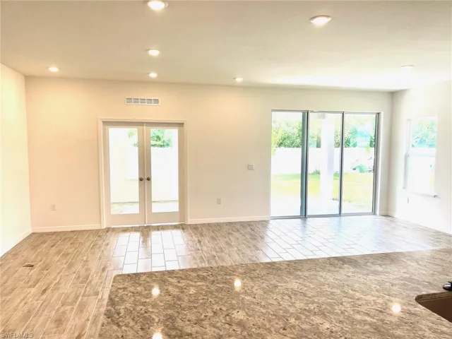 Gorgeous Kitchen -large island, granite countertops, stainless appliances, & spacious cabinets