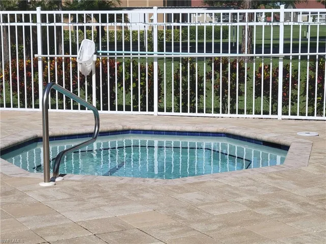 Spa near pool.