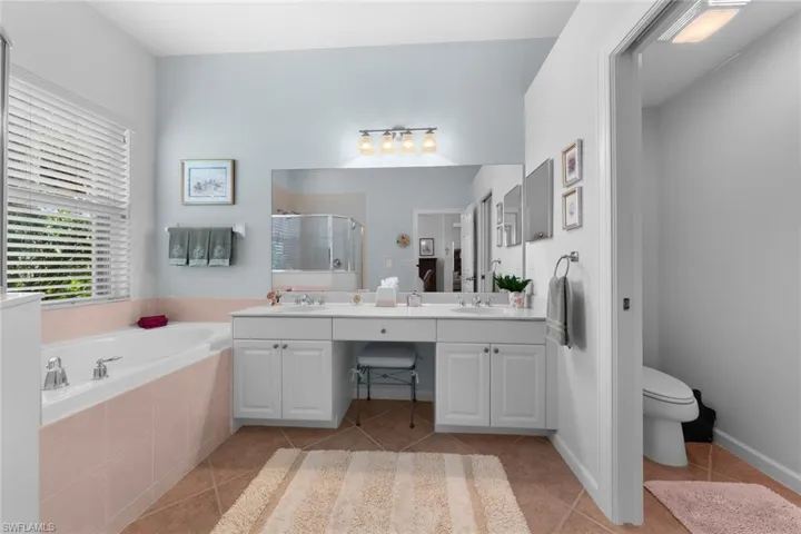Primary Bathroom with Separate Tub and Shower