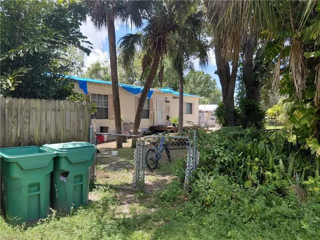 View of yard with a gate