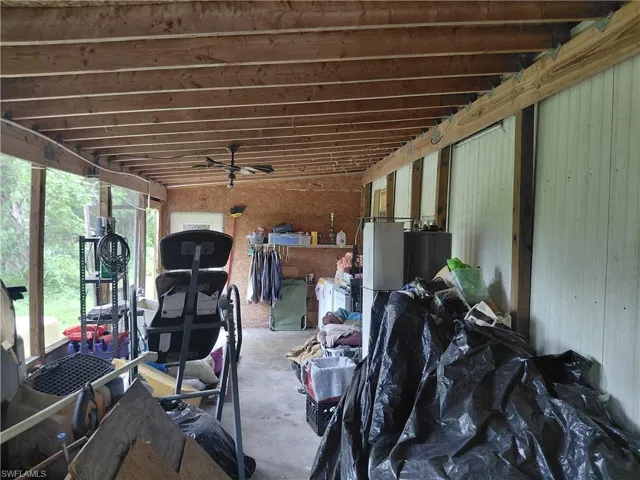View of patio featuring ceiling fan