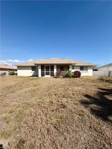 View of front facade with stucco siding