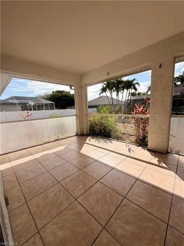 View of patio / terrace with a sunroom