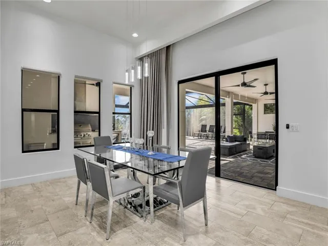 Dining room featuring recessed lighting and a sunroom