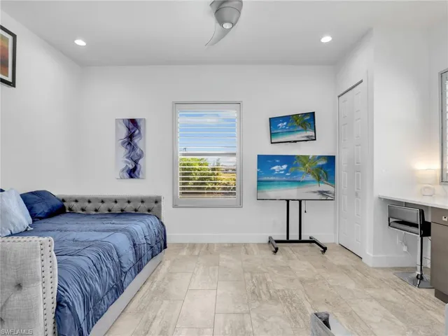 Bedroom featuring recessed lighting