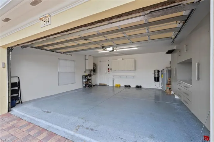 built in cabinets and epoxy floors