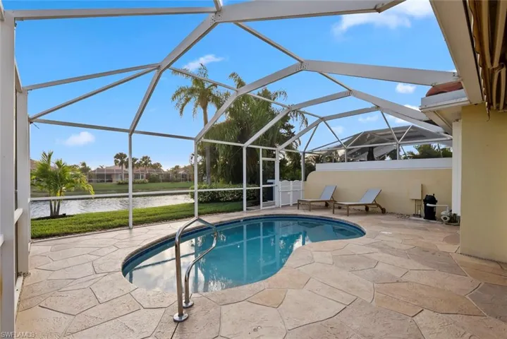 Outdoor pool with privacy wall