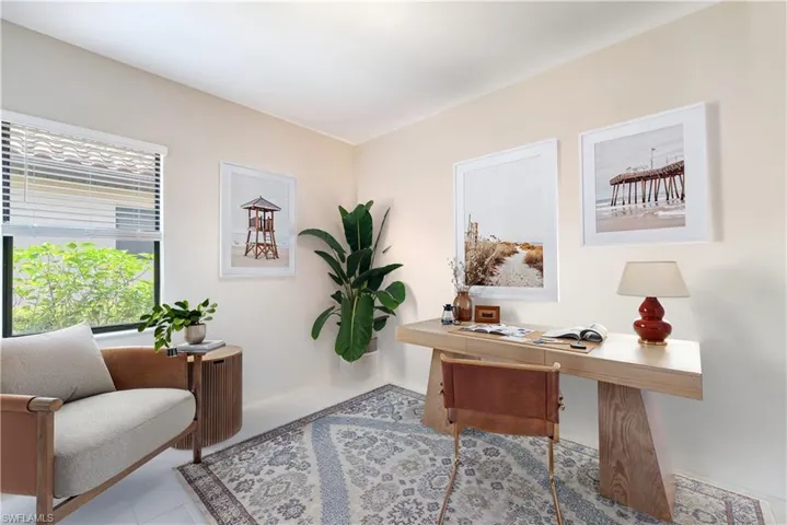 Tiled office space featuring baseboards