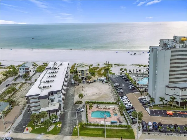 Aerial view of a pool and extended coastline