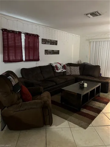 View of tiled living room