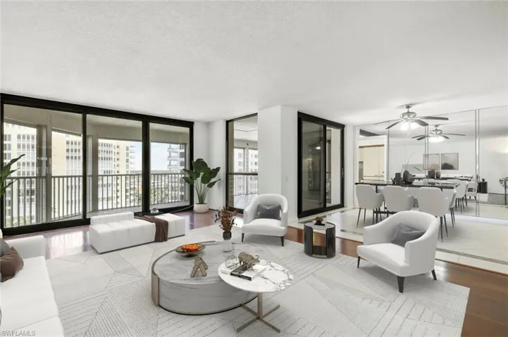 Virtually staged living room and dining room.
