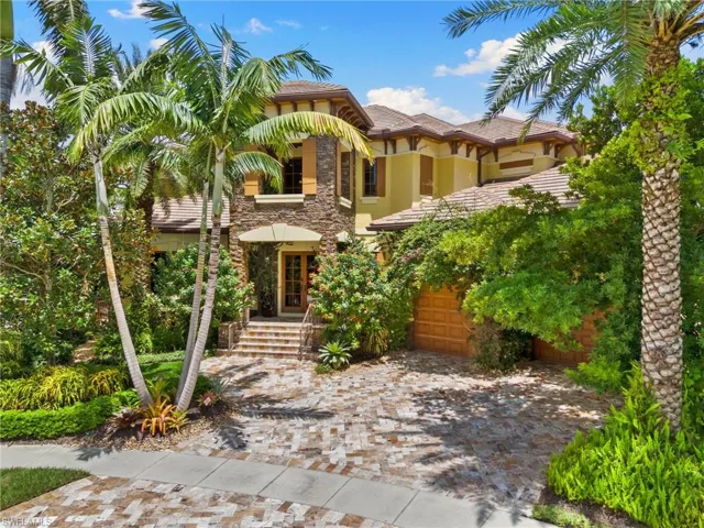 Mediterranean / spanish house with 3 car garage