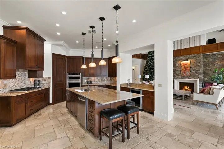 Kitchen featuring a 9 1/2ft center island and walk in pantry