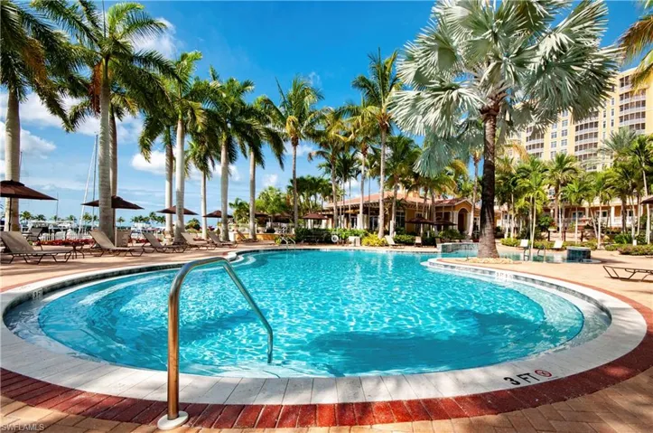 Community pool with a patio area