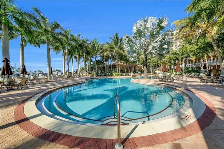 Community pool with a patio area