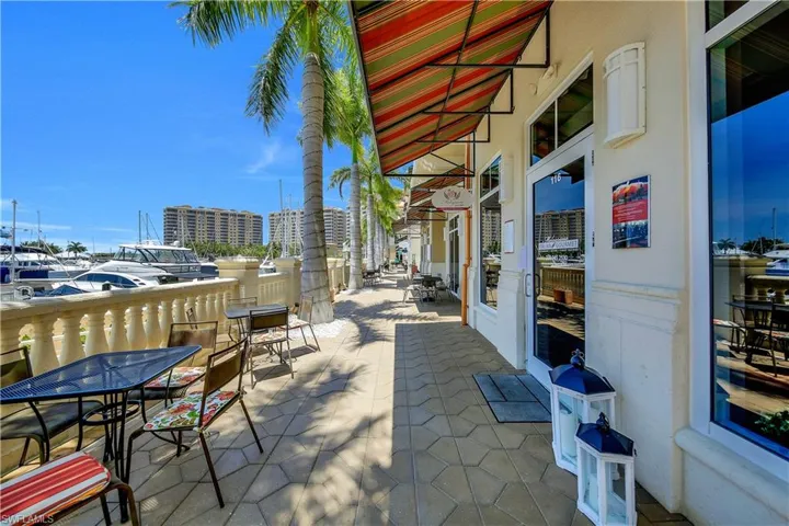 View of patio / terrace featuring outdoor dining area and a water view