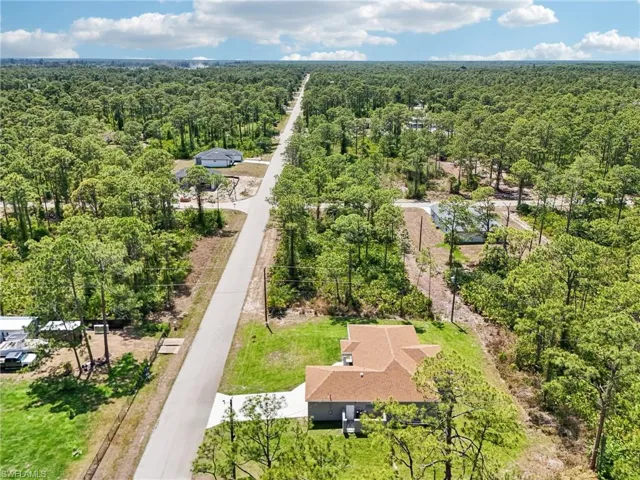 Drone / aerial view of a heavily wooded area