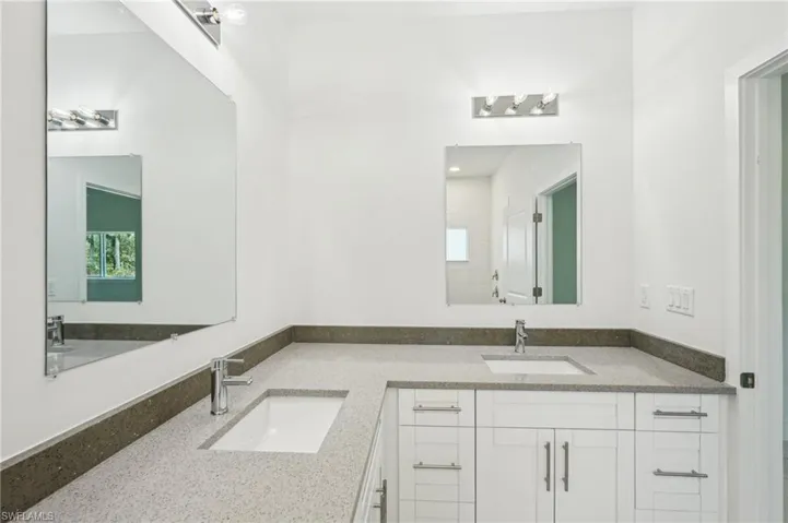 Full bathroom with double vanity