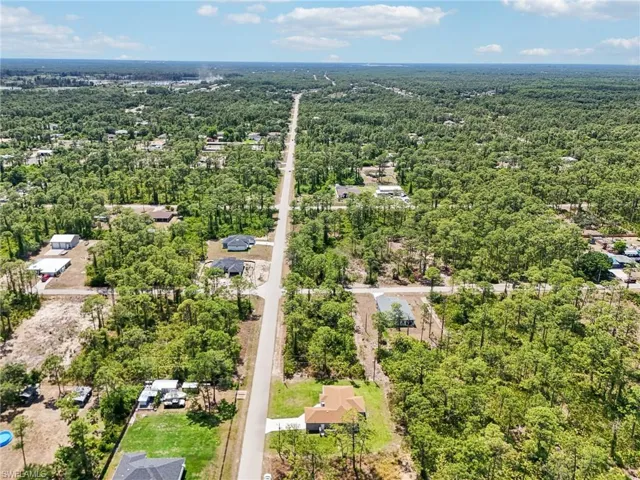 Drone / aerial view of a heavily wooded area