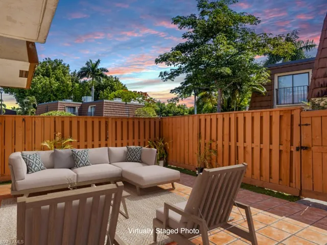 Virtually Staged vast fenced in patio