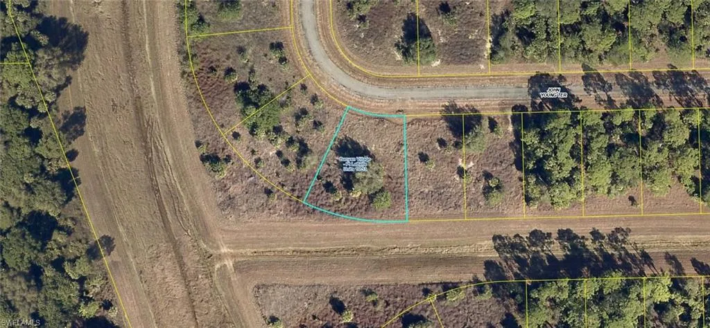 Aerial overview of property's location featuring property parcel outlined
