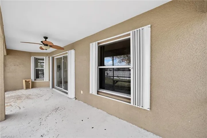 View of patio with a ceiling fan