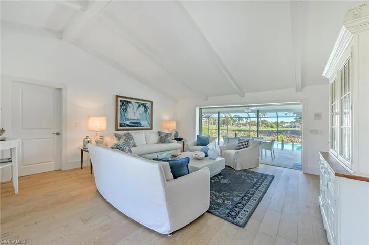 Living room with light wood-type flooring