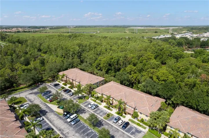 Aerial view of a nearby body of water and a local golf course