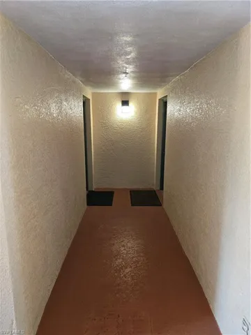 Hallway with a textured wall