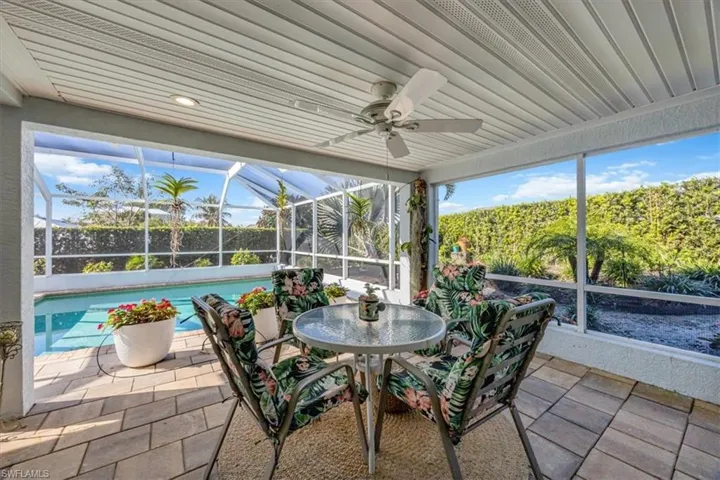 Dine outside by gardens and pool