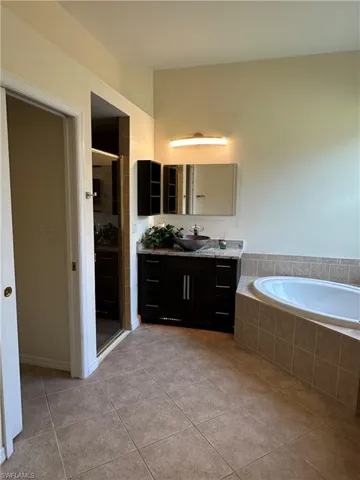 Master bath with soaking tub and walk in shower