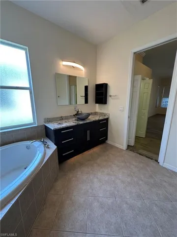 Pocket door to the master bedroom from master bathroom