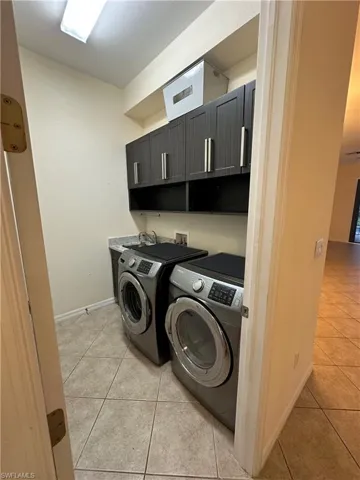 Laundry Room, with utility sink and cabinets