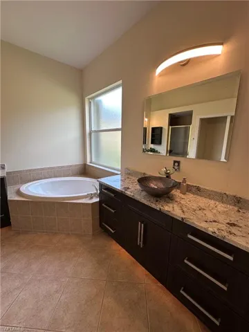 Dual countertops and sinks. Updated and modern cabinets and finishes
