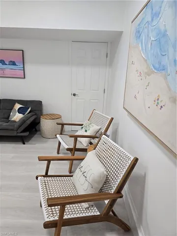 Living area featuring light hardwood / wood-style floors